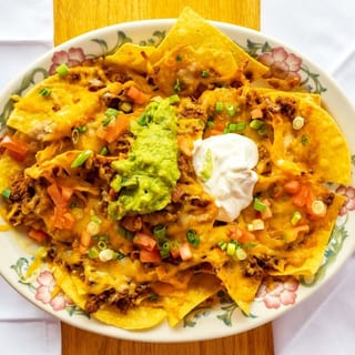 2. Nachos with Carnitas, Ground Beef, Chicken or Beans